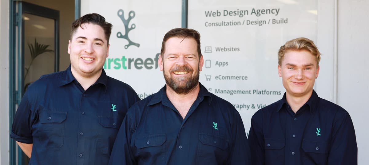 3 Website designers standing outside their office in Albany